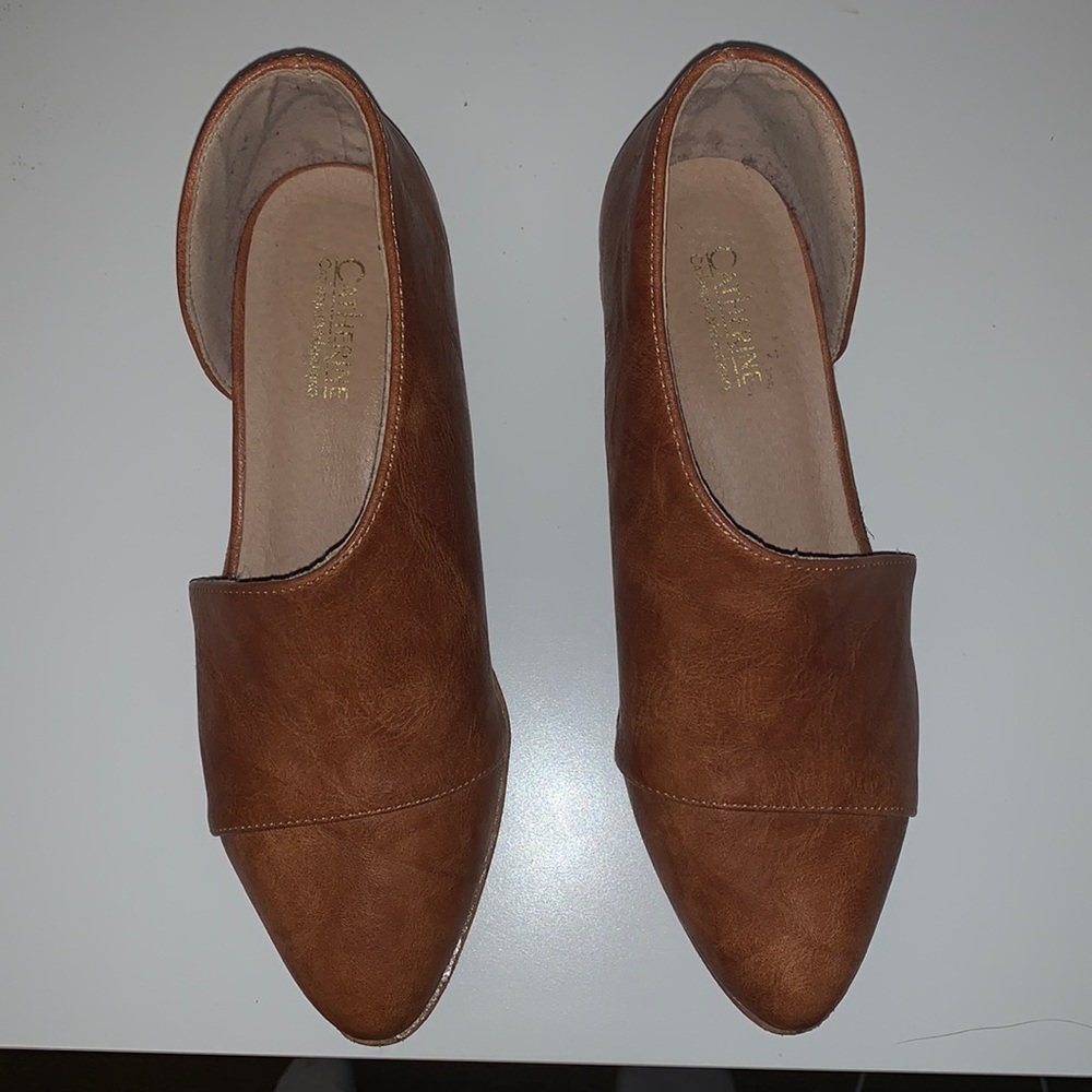 Brown asymmetrical loafers